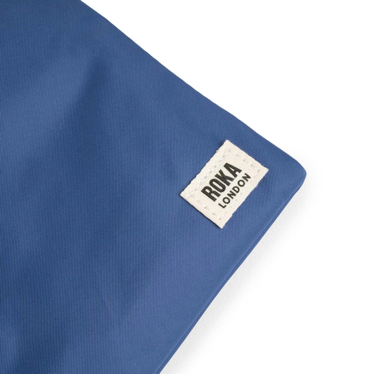 ROKA London - Chelsea XS slingväska med ficka #Färg_Burnt_Blue
