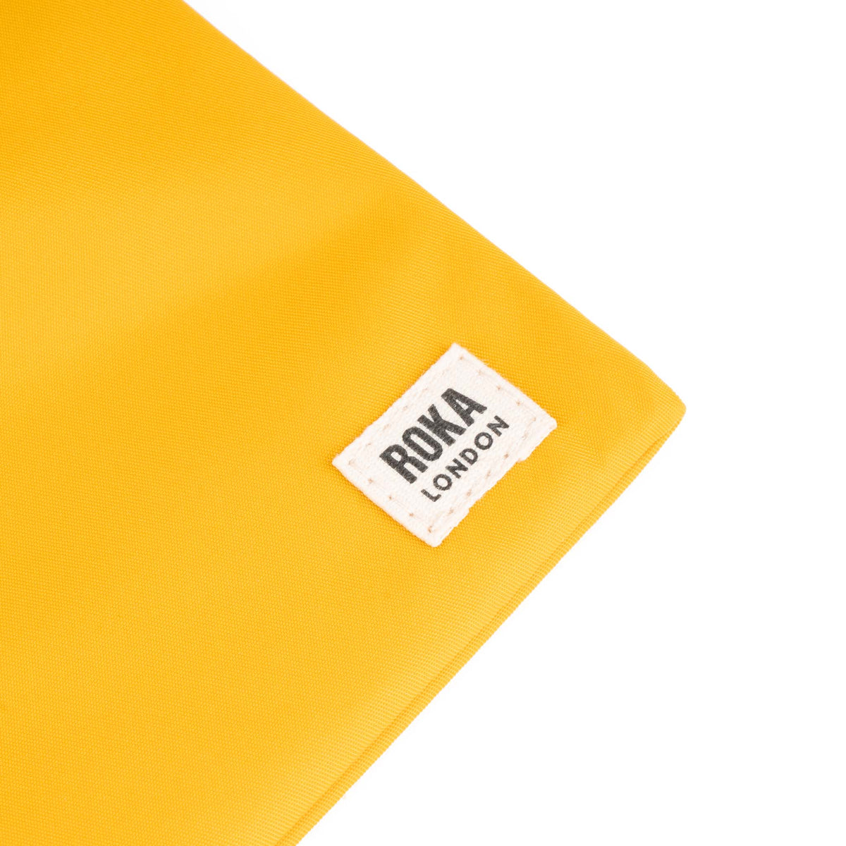 ROKA London - Chelsea XS slingväska med ficka #Färg_Saffron